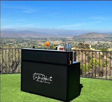 Mobile bar with valley view at an outdoor venue