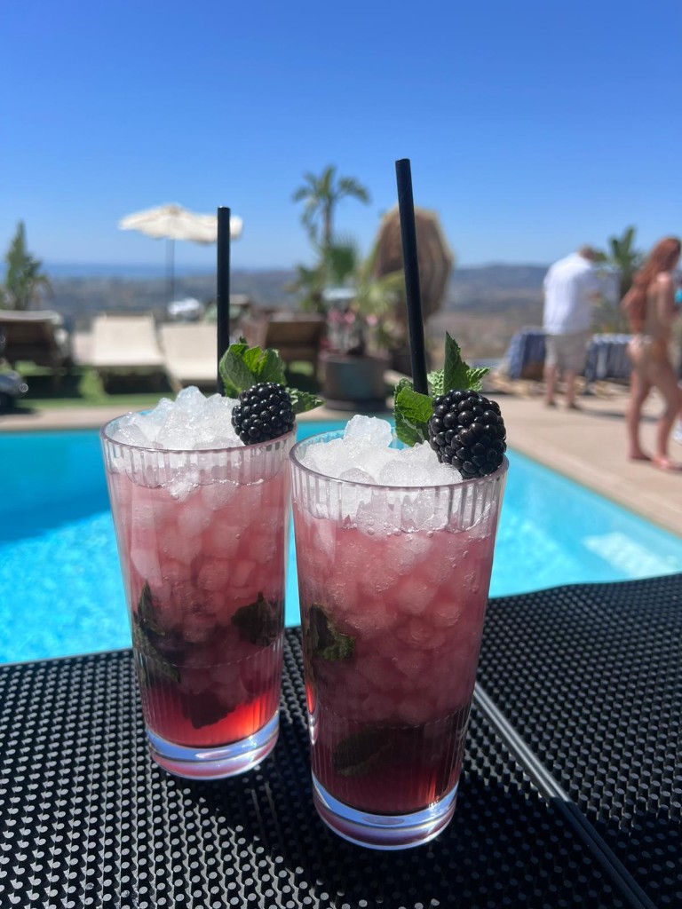 Cocktails served by the pool at a villa celebration